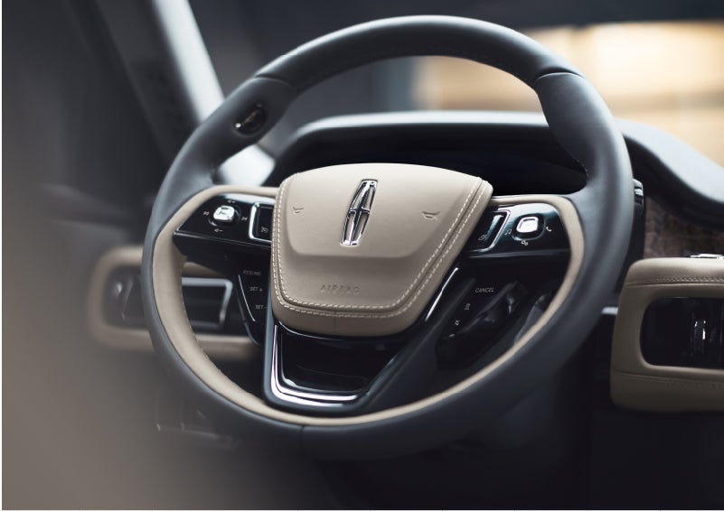 The intuitively placed controls of the steering wheel on a 2023 Lincoln Aviator® SUV | Bozard Lincoln in Saint Augustine FL