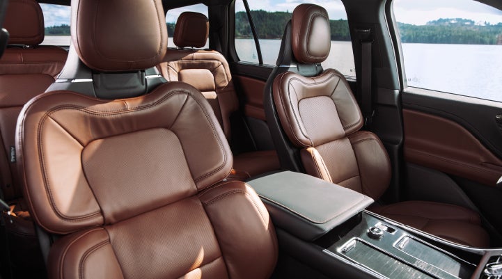 The front row's Perfect Position Seats in a 2024 Lincoln Aviator® Reserve model with Ebony Roast interior | Bozard Lincoln in Saint Augustine FL