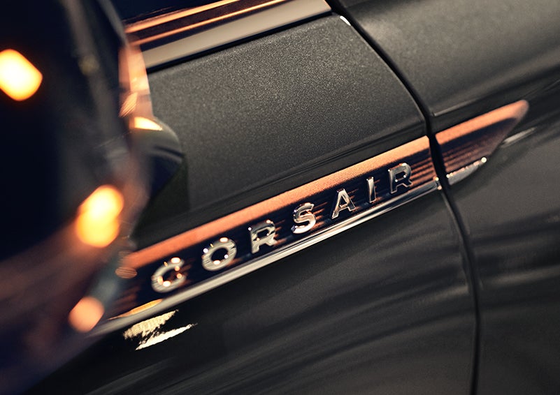 The stylish chrome badge reading “CORSAIR” is shown on the exterior of the vehicle. | Bozard Lincoln in Saint Augustine FL