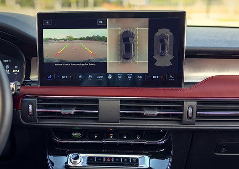 The driver of a 2024 Lincoln Corsair® SUV is shown selecting the drive mode. | Bozard Lincoln in Saint Augustine FL