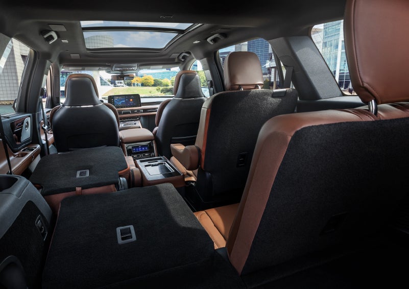The interior of the 2025 Lincoln Aviator® SUV is shown with two seats folded down for added space. | Bozard Lincoln in Saint Augustine FL