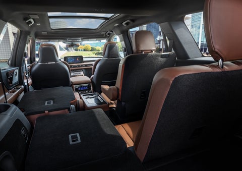 The interior of the 2025 Lincoln Aviator® SUV is shown with two seats folded down for added space. | Bozard Lincoln in Saint Augustine FL
