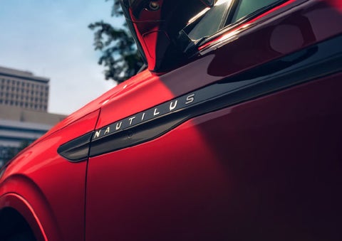 A side badge on the passenger door reads Nautilus. | Bozard Lincoln in Saint Augustine FL