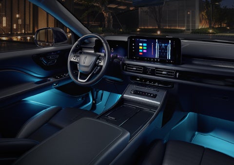 Deep blue Ambient Lighting glows from various places within a 2026 Lincoln Aviator® SUV. | Bozard Lincoln in Saint Augustine FL