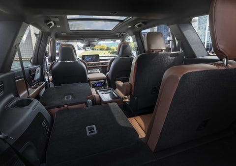 One side of the PowerFold® third-row seat and a second-row seat are folded forward in the 2026 Lincoln Aviator® SUV. | Bozard Lincoln in Saint Augustine FL