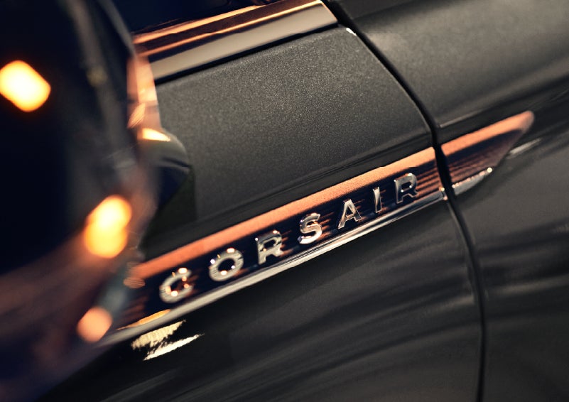 A 2026 Lincoln Corsair® SUV is shown being driven on a country road. | Bozard Lincoln in Saint Augustine FL