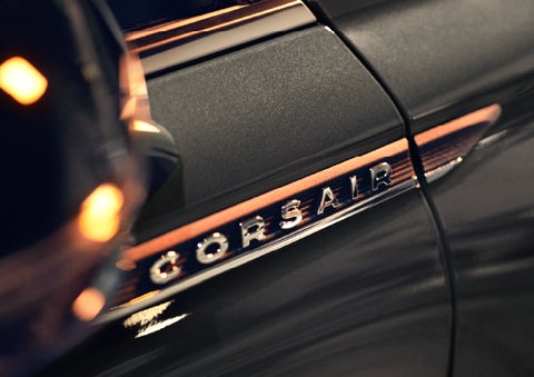 The stylish chrome badge reading “CORSAIR” is shown on the exterior of the vehicle. | Bozard Lincoln in Saint Augustine FL