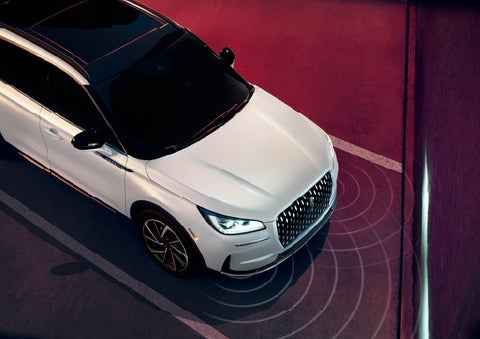 Simulated radar signals are shown emitting from the front of a 2026 Lincoln Corsair® SUV. | Bozard Lincoln in Saint Augustine FL