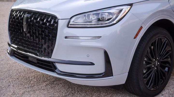 The all-black grille of the available Jet Appearance Package on a 2026 Lincoln Corsair® SUV is shown. | Bozard Lincoln in Saint Augustine FL