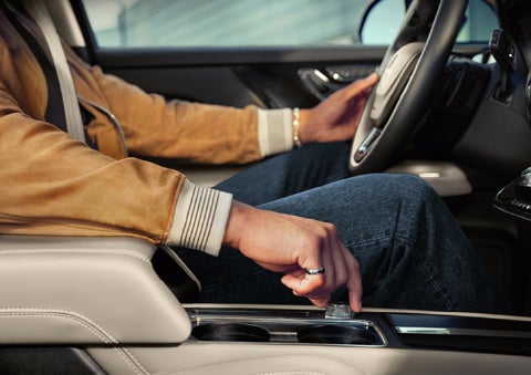The driver of a 2026 Lincoln Corsair® SUV is shown selecting a drive mode. | Bozard Lincoln in Saint Augustine FL