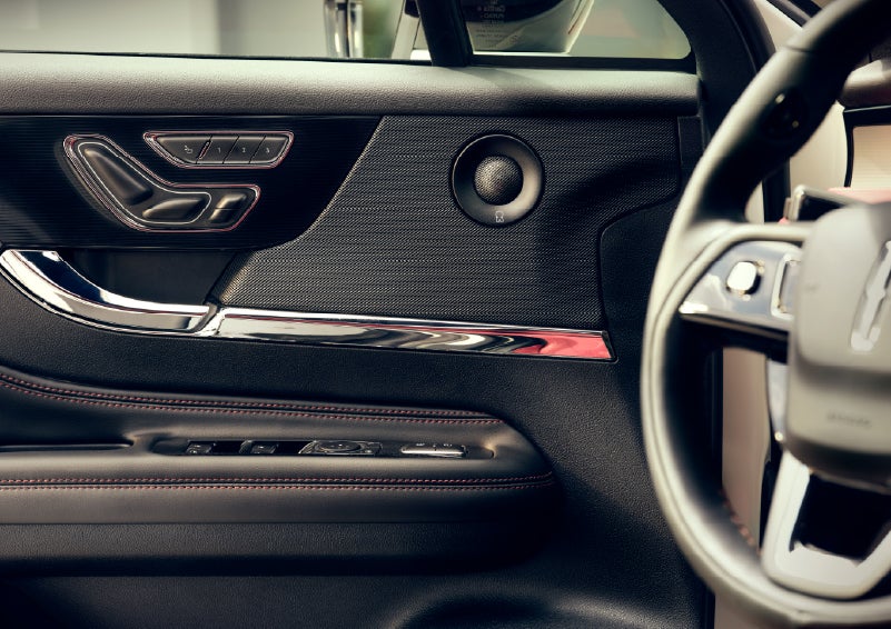 An audio speaker is shown in the driver's side door of a 2026 Lincoln Corsair® SUV | Bozard Lincoln in Saint Augustine FL