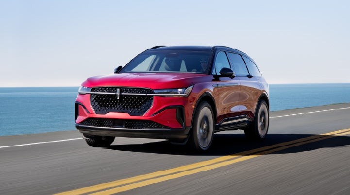 A 2026 Lincoln Nautilus® SUV is being driven on a seaside roadway. | Bozard Lincoln in Saint Augustine FL