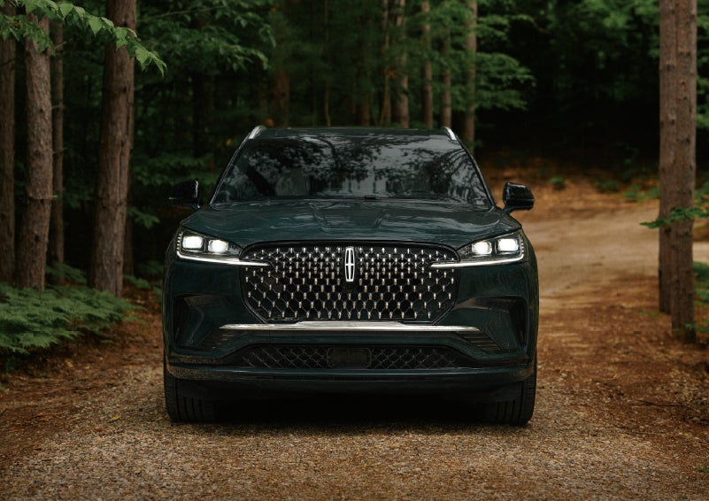 The front grille of a 2027 Lincoln Aviator® Black Label™ SUV is shown. | Bozard Lincoln in Saint Augustine FL