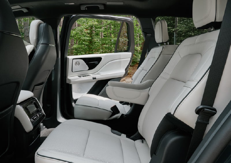 A side view of the second row with captain’s chairs in a 2027 Lincoln Aviator® Black Label™ SUV. | Bozard Lincoln in Saint Augustine FL